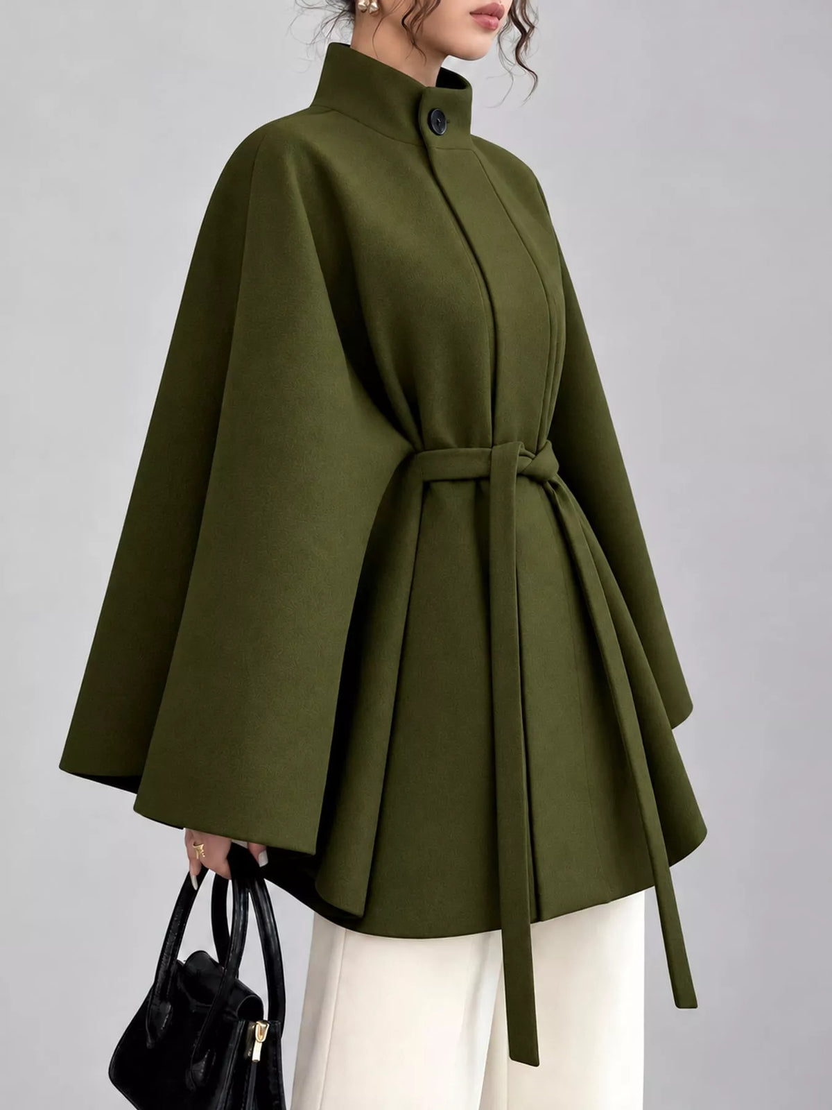 Green tie-waist cape — side view