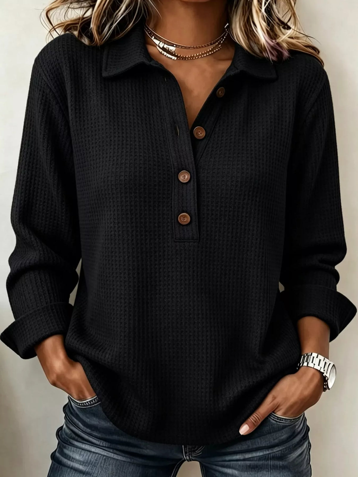 Black waffle knit long sleeve polo top, front view