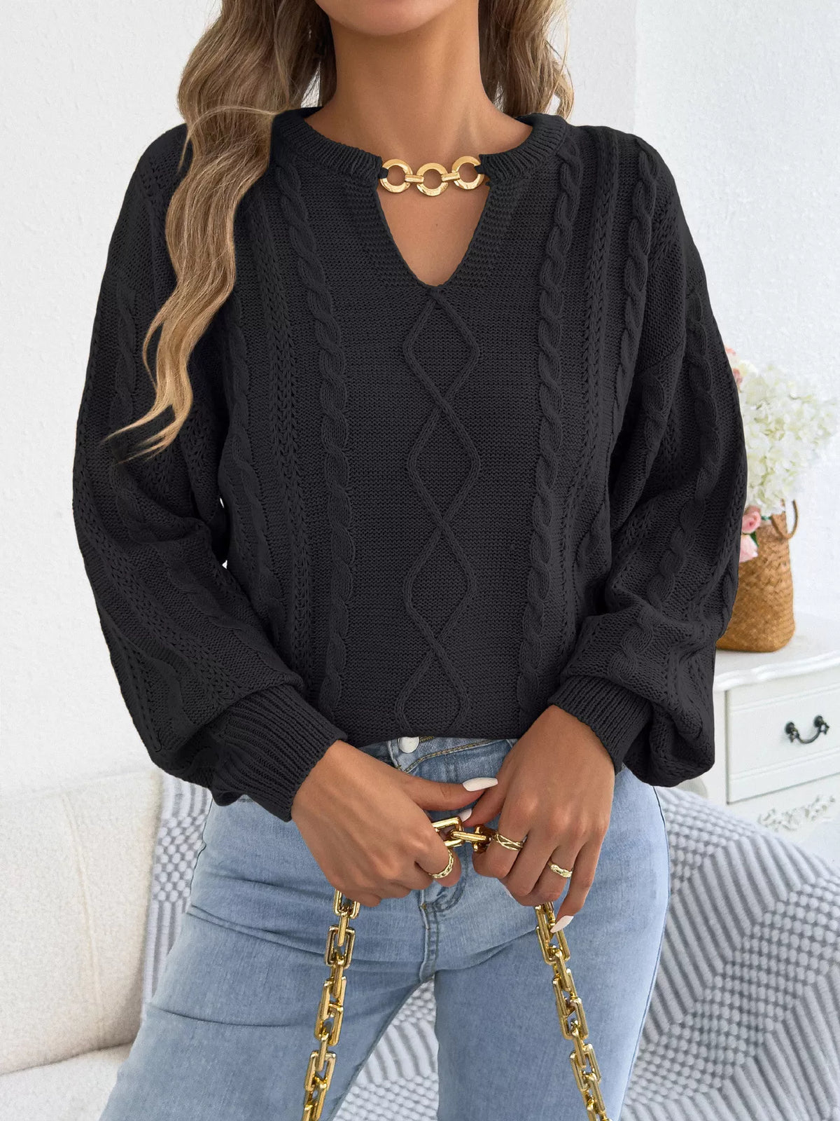Black cable knit notched sweater