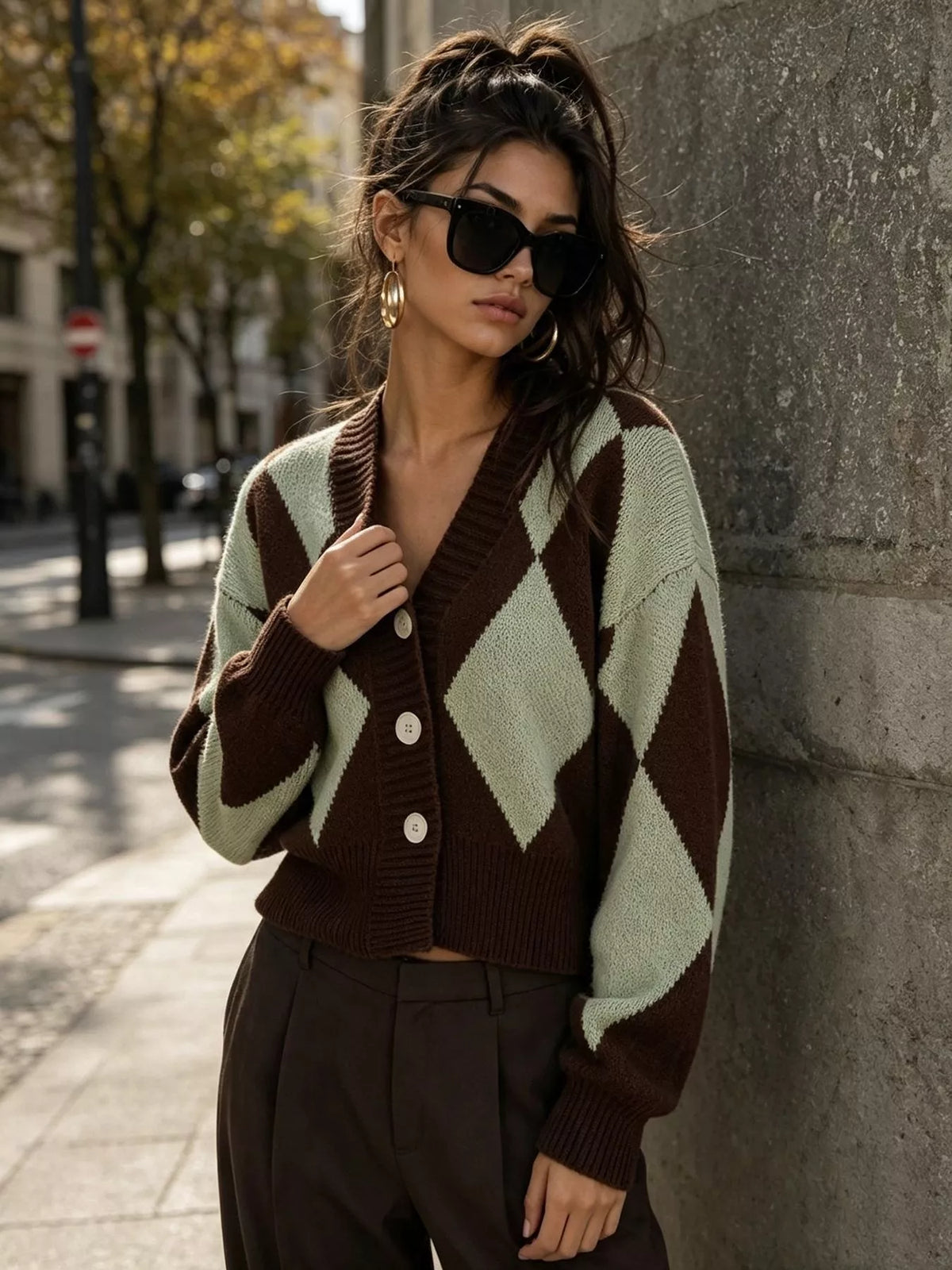 Brown and green argyle v-neck button-front cardigan, standing front view.