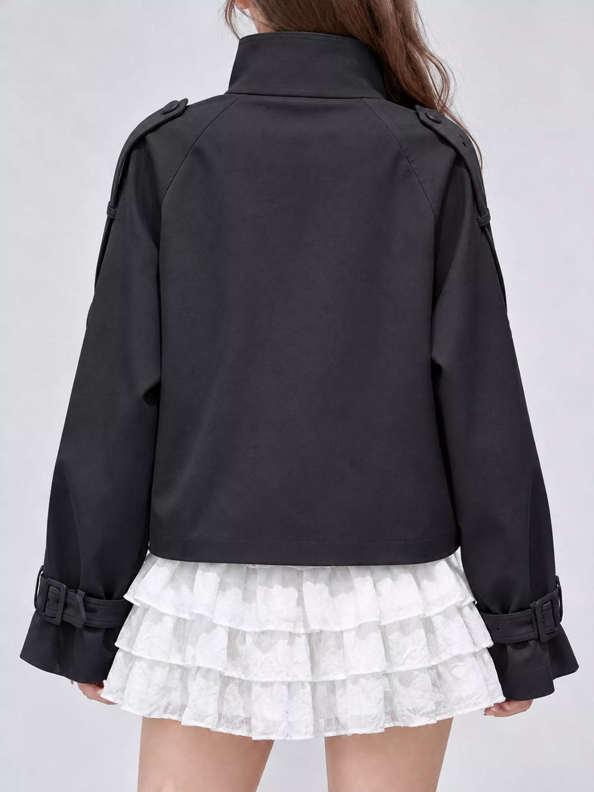 Black double-breasted stand collar cropped trench jacket, back view