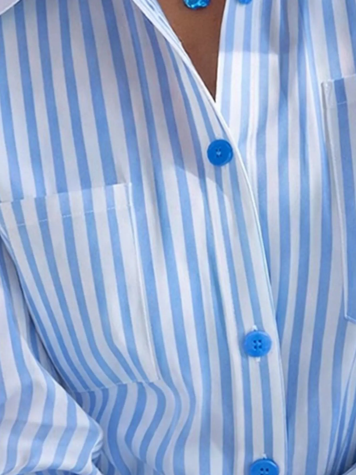 Women's Striped Button-Down Shirt in blue and white — button detail view