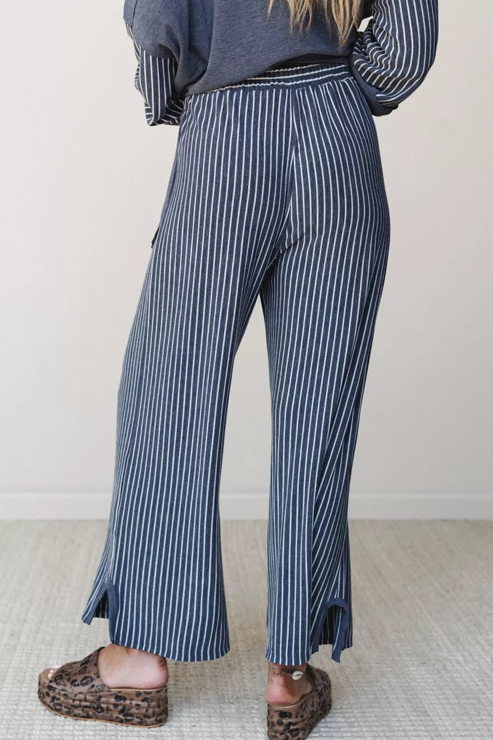Top and drawstring pants set, blue striped pants back