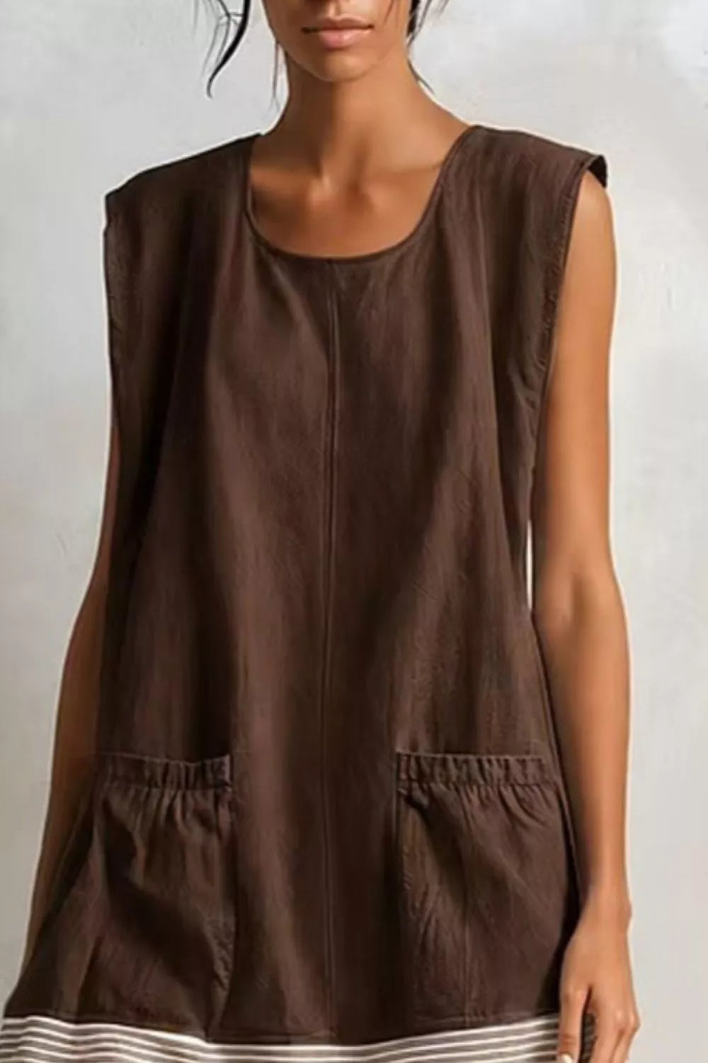 Brown and cream ruffled-hem sleeveless dress, neckline detail