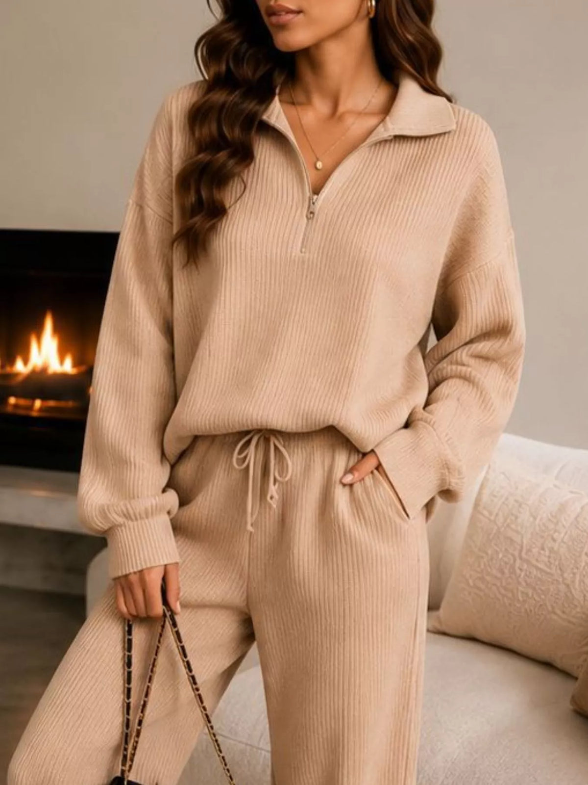 Beige quarter-zip knit top and pants set, zip neckline and waist detail