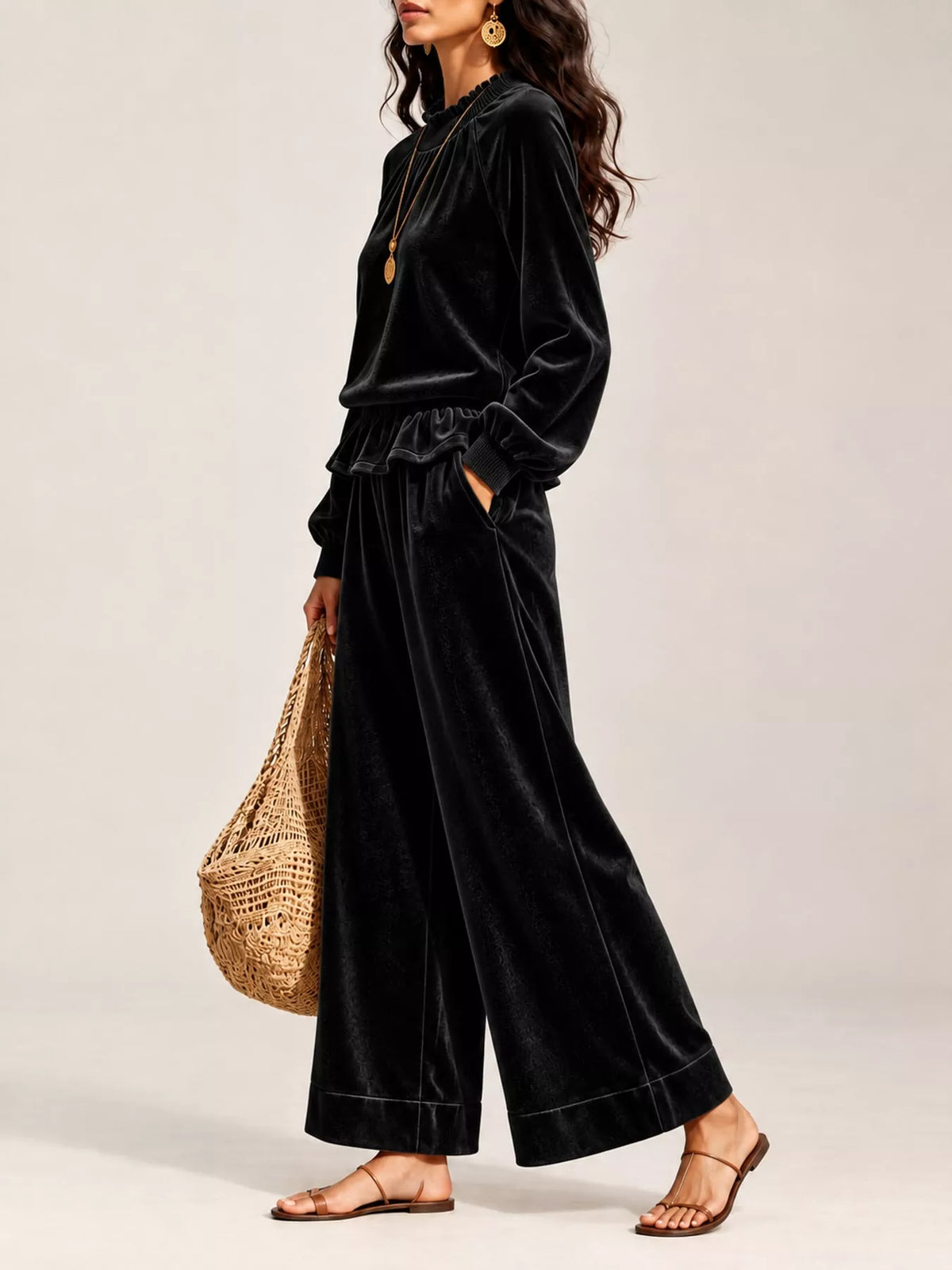 Black velvet ruffled hem top and wide-leg pants set — side view