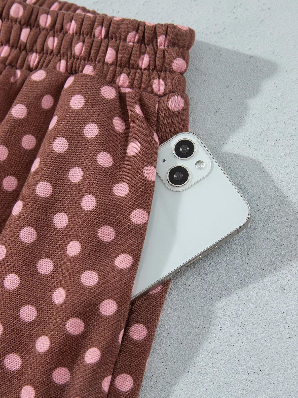Polka-dot top and shorts set, shorts pocket detail