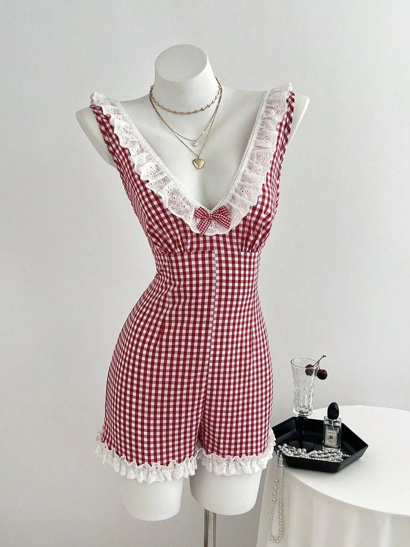 Trendsi Gingham Lace-Trimmed Romper with Bow Detail -