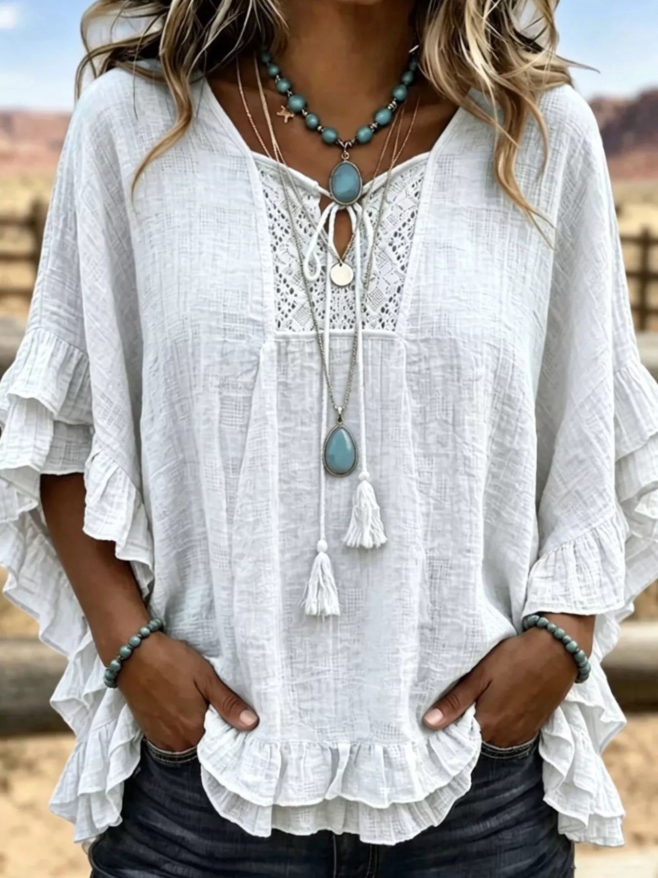 Trendsi Full Size Tassel Tie Neck Ruffled Hem Blouse Plus Size -