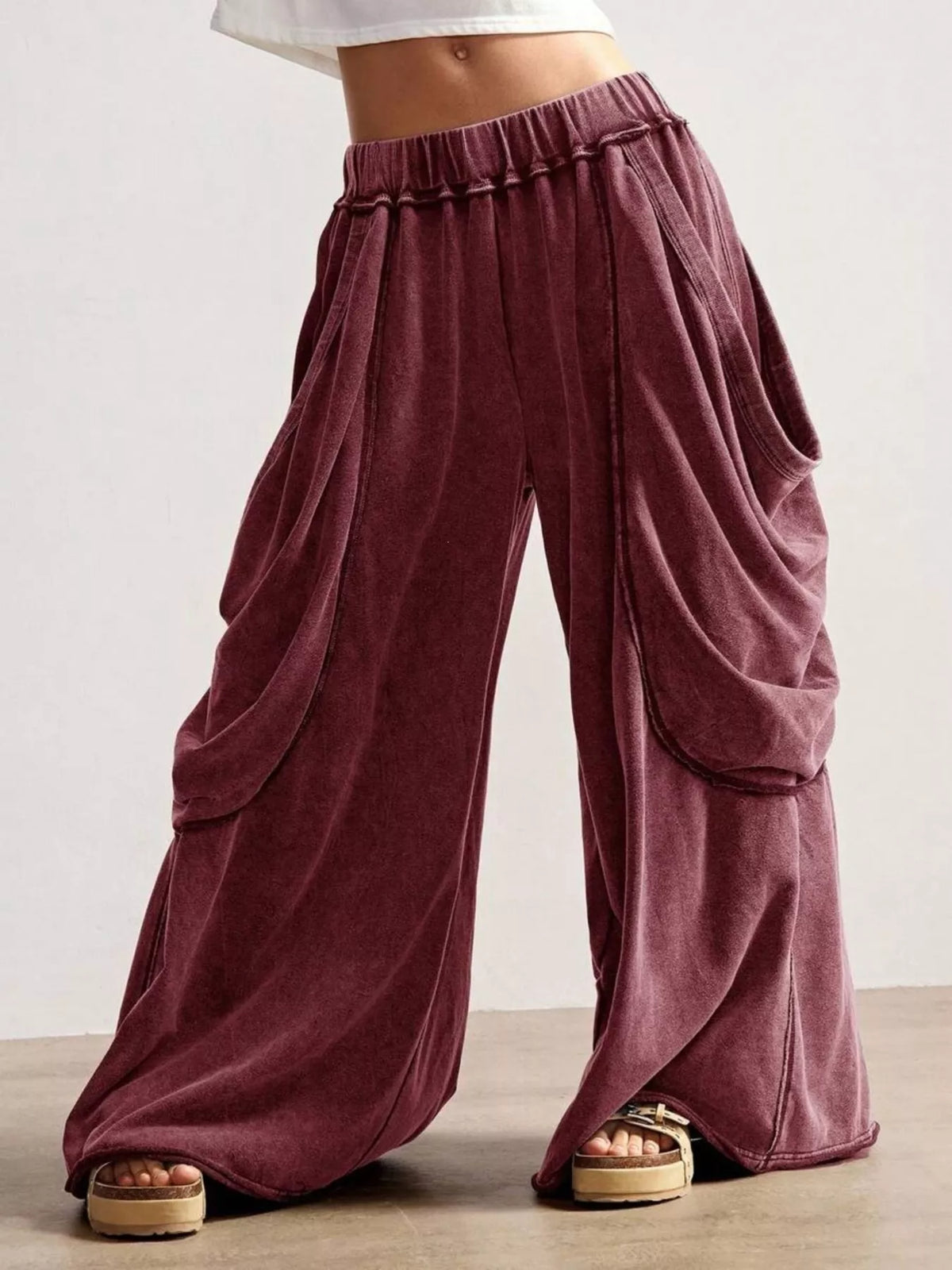 Burgundy wide-leg cargo pants, front view