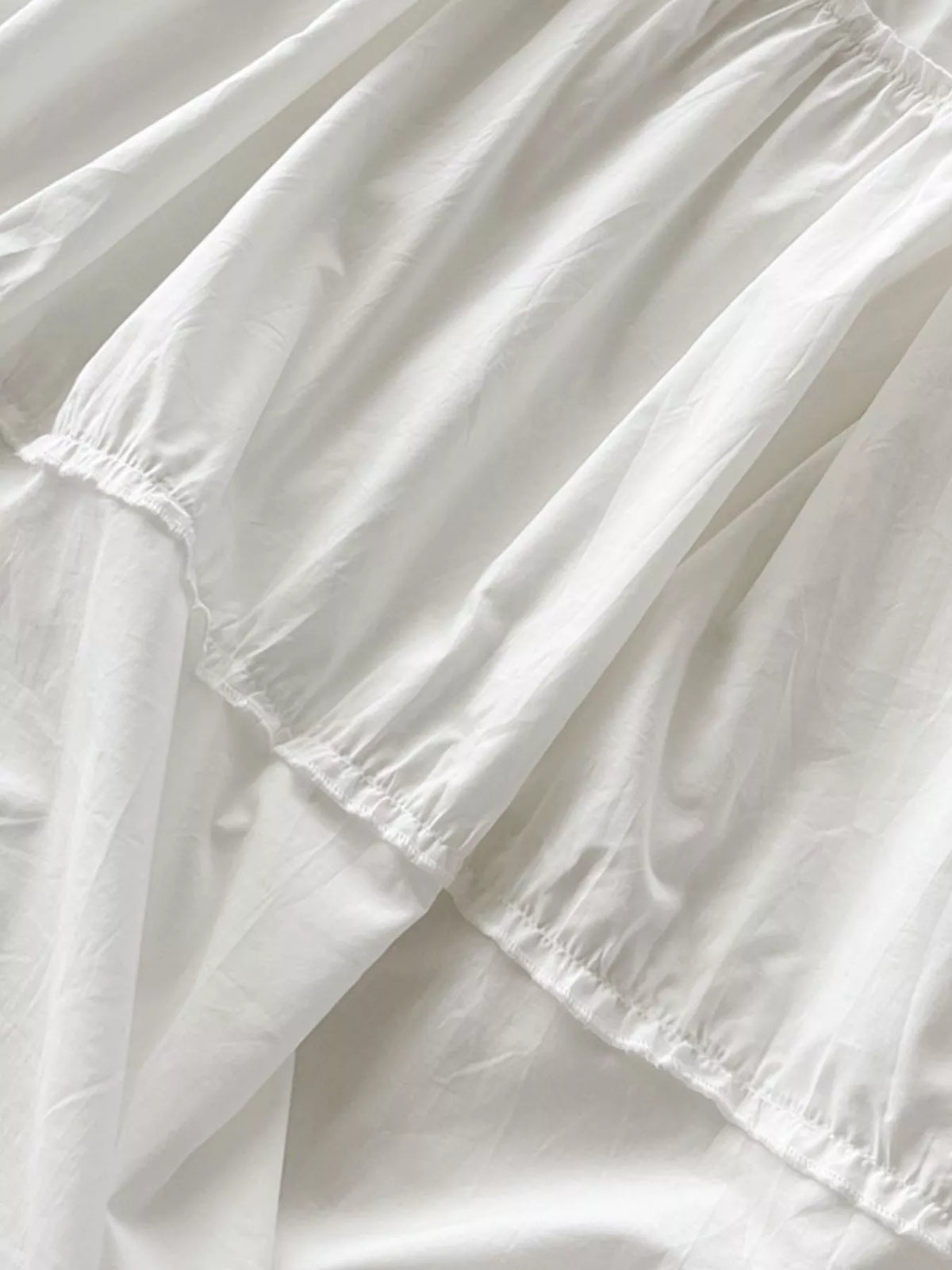 Women's Ruffled Square Neck Tiered Maxi Dress in white — skirt detail view