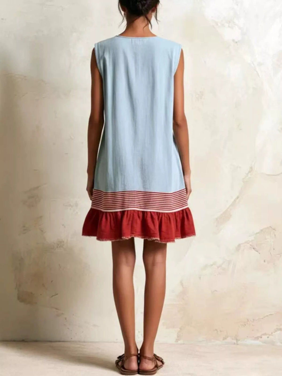 Light blue and burgundy ruffled-hem sleeveless dress, back view