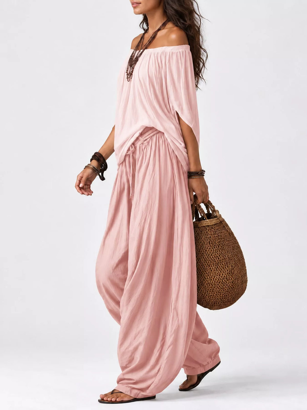 Pink off-shoulder top and wide-leg harem pants set — side view