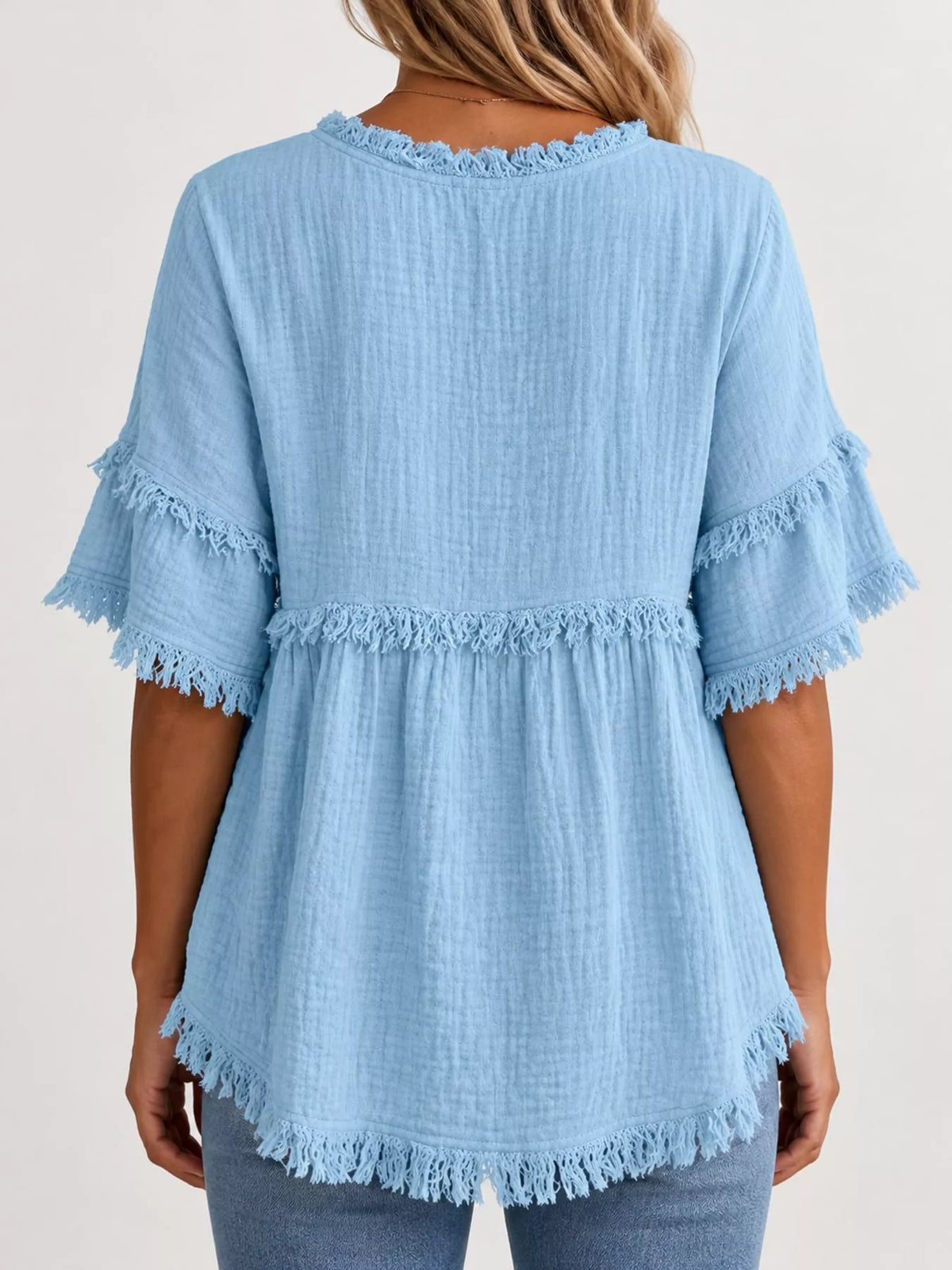 Blue frayed edge textured blouse, back view