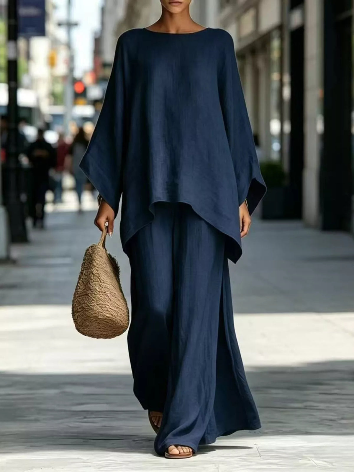 Navy blue batwing top and wide-leg pants set, front view