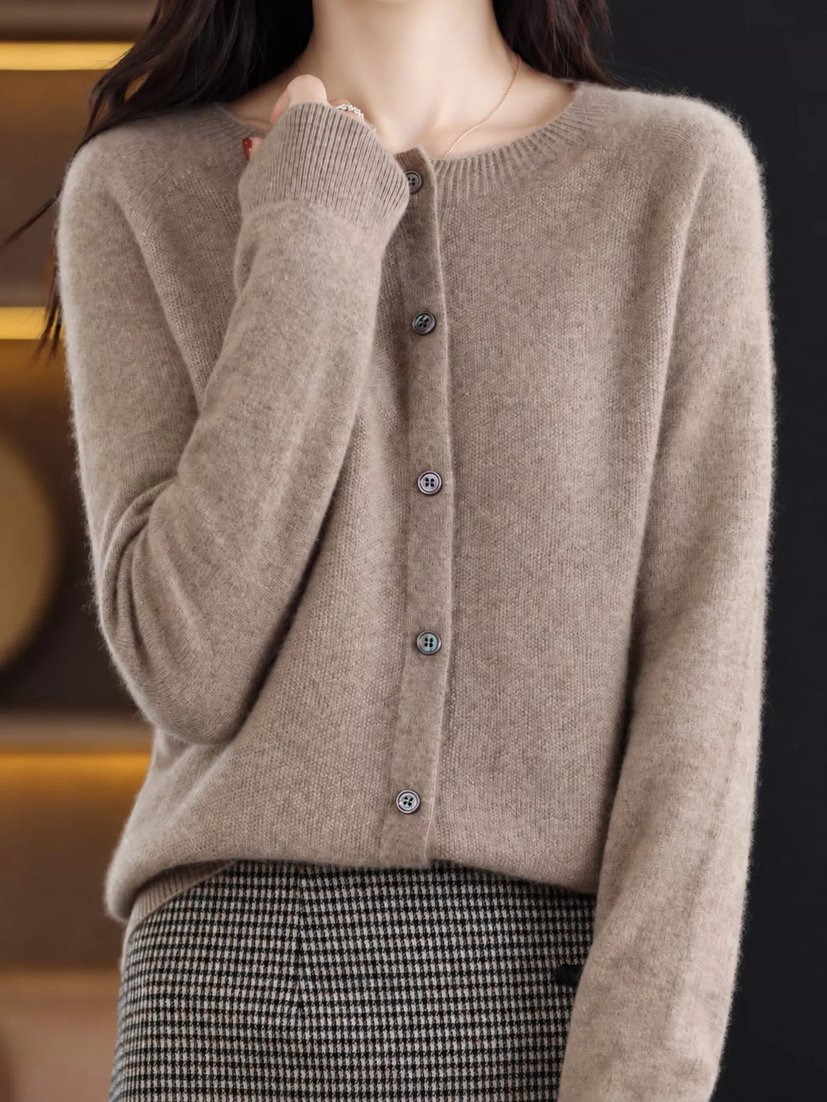 Round neck long sleeve cardigan, front view on model