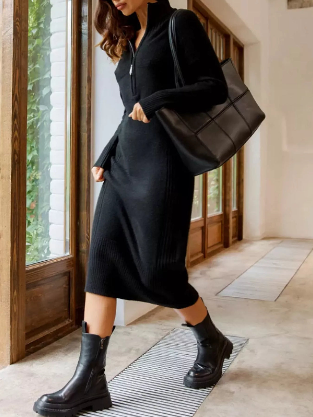 Black half-zip ribbed knit sweater dress — front view
