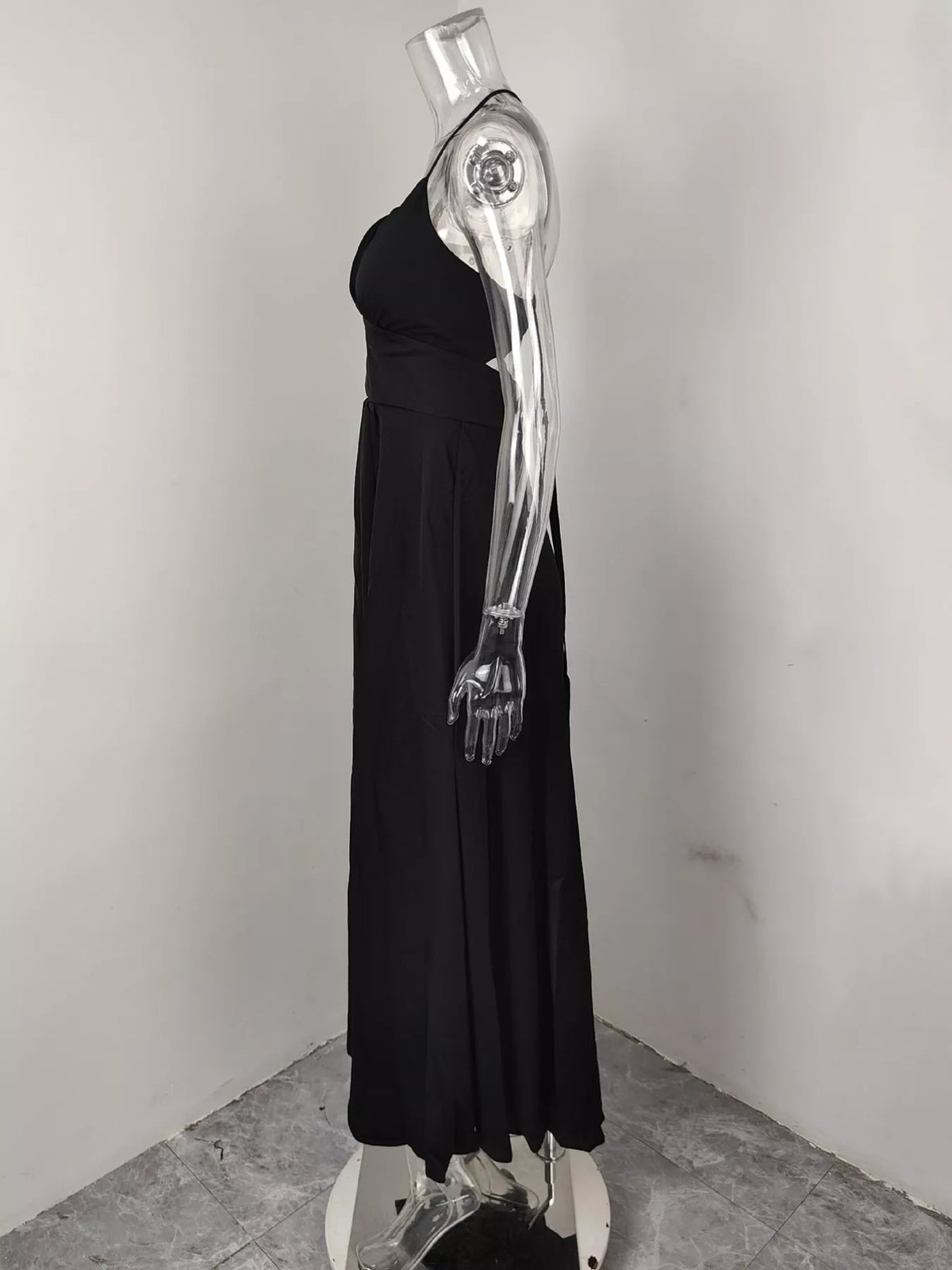 Black sleeveless high slit maxi dress, side view
