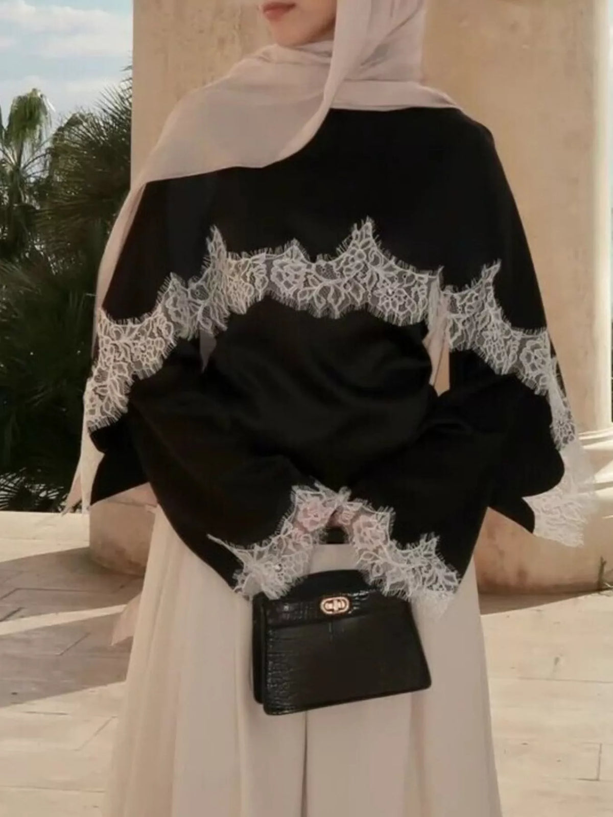 Round neck long sleeve blouse, front view on model