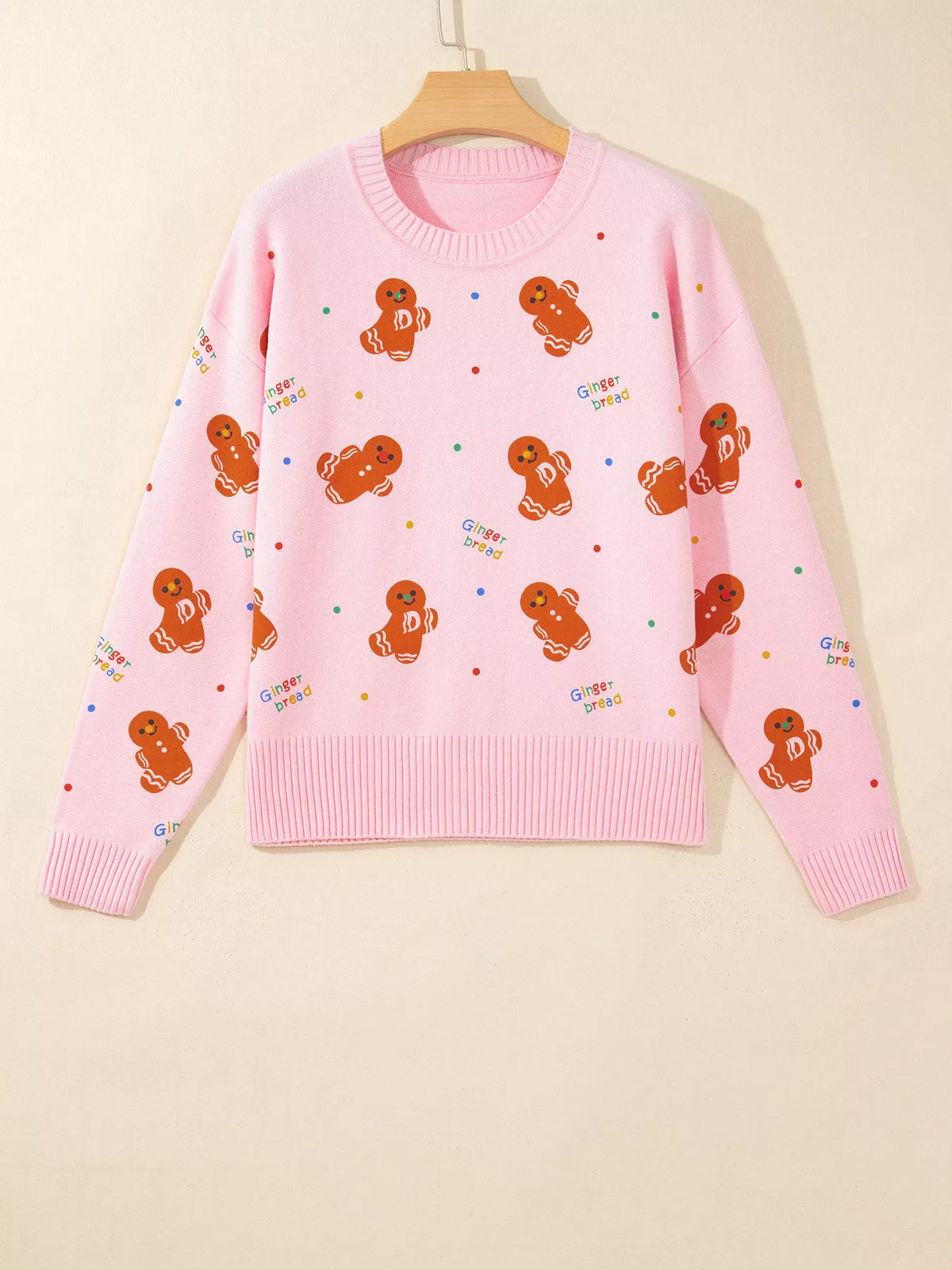 Gingerbread Pattern Long Sleeve Round Neck Sweater in pink, hanger front view