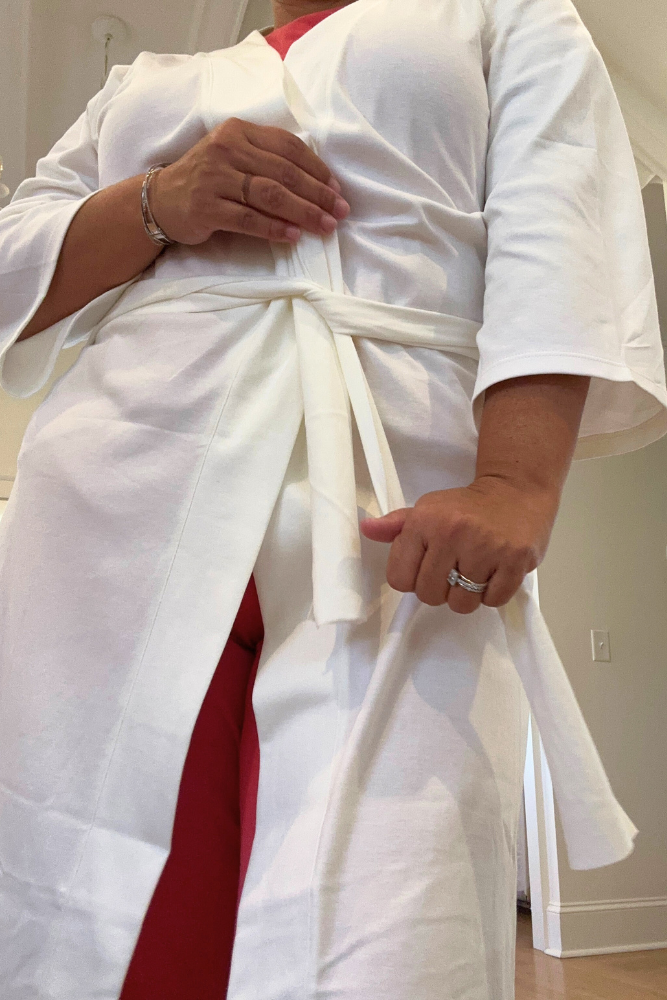 White Pima cotton wrap robe with self-tie belt, close-up