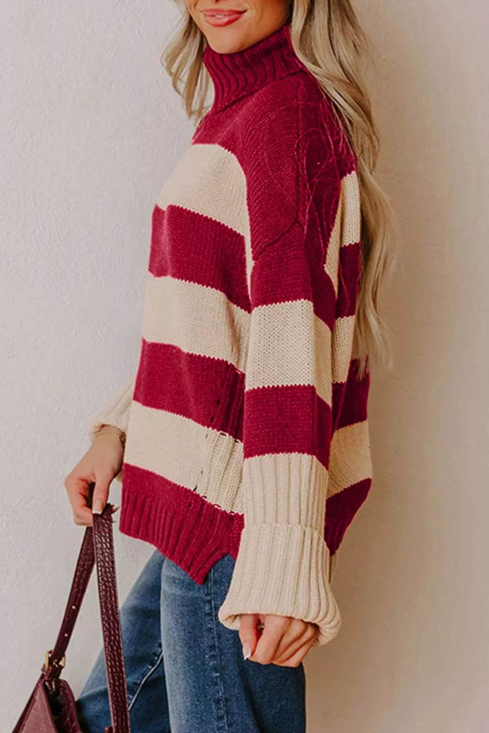 Striped High Neck Ribbed Trim Sweater in red and cream, side view
