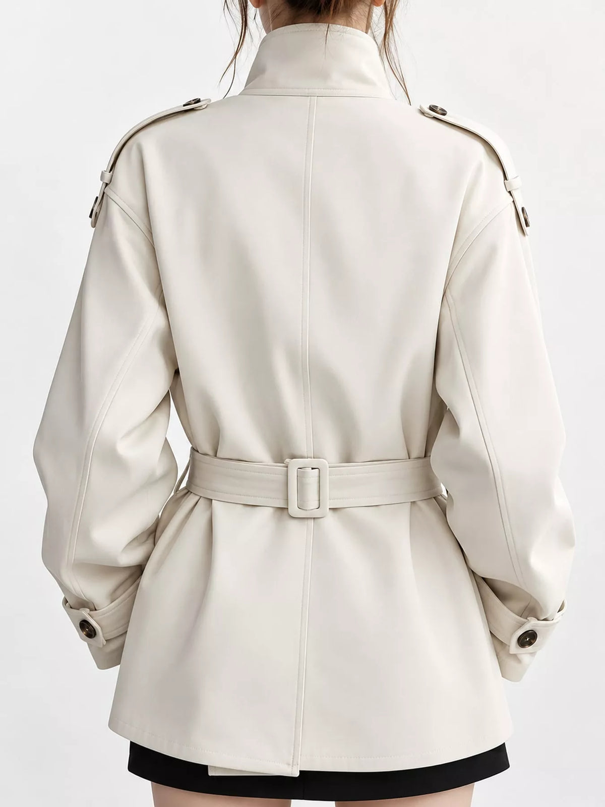 Cream double-breasted high-neck belted trench coat, back view