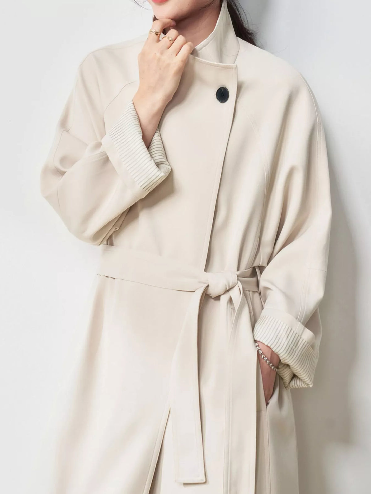 Asymmetric Button Longline Trench Coat, detail view in cream