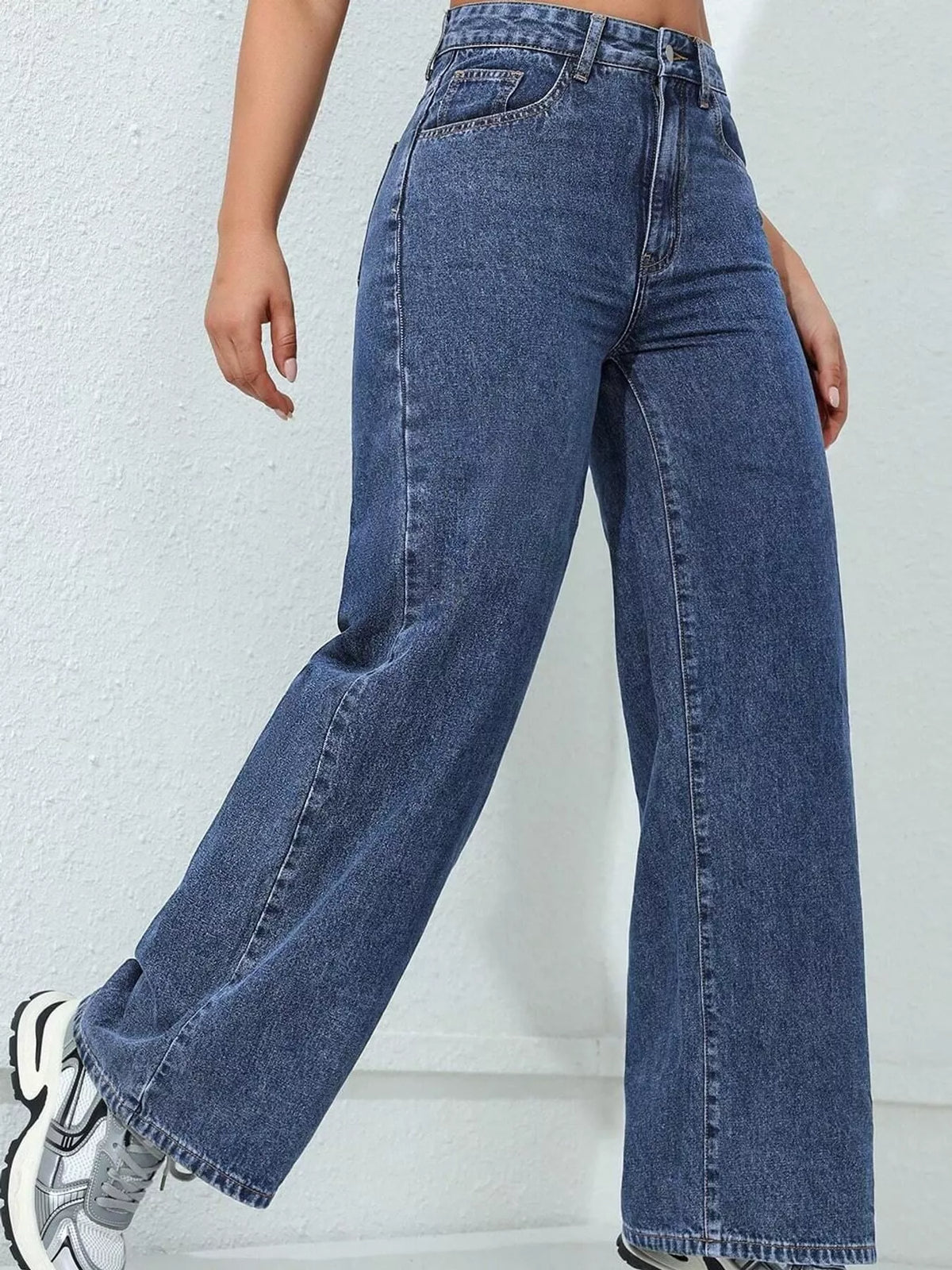 Blue high waisted wide leg jeans, side view