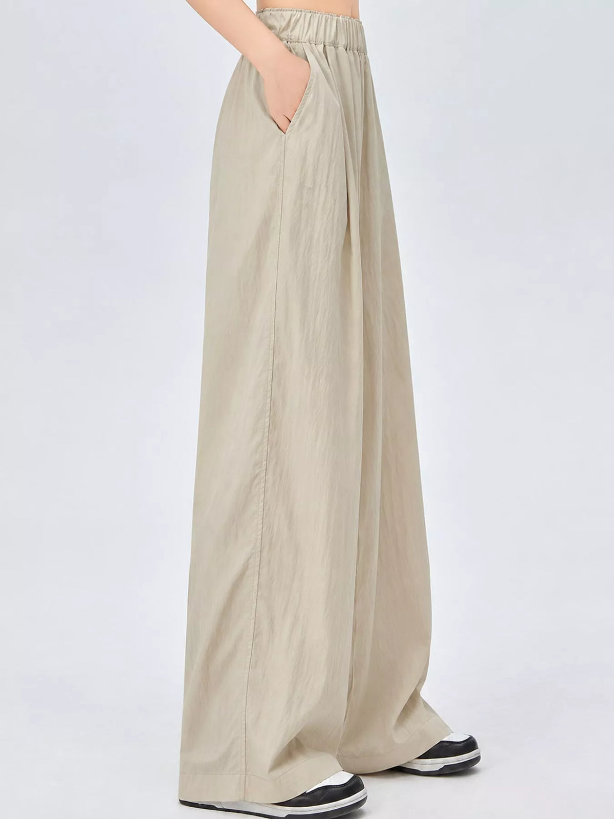 Women's High-Waisted Loose Fit Wide-Leg Casual Pants in beige — side view