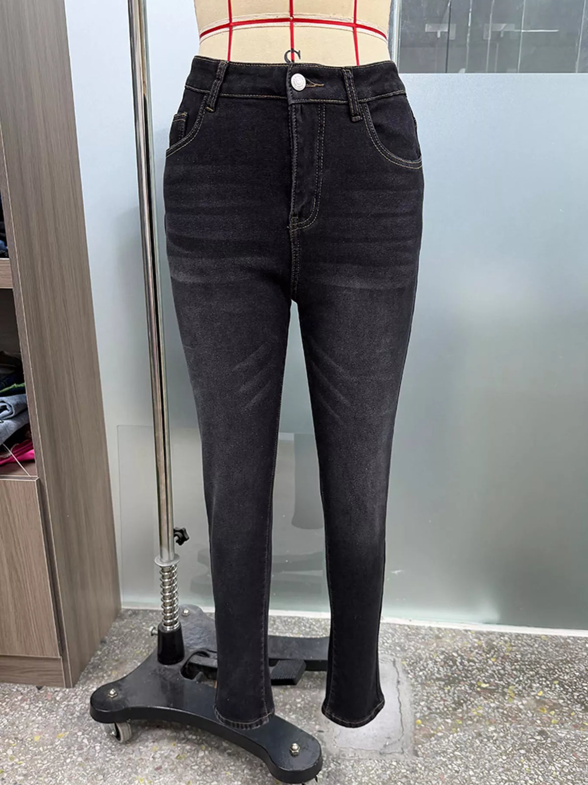 High-waisted fleece-lined skinny jeans, back view