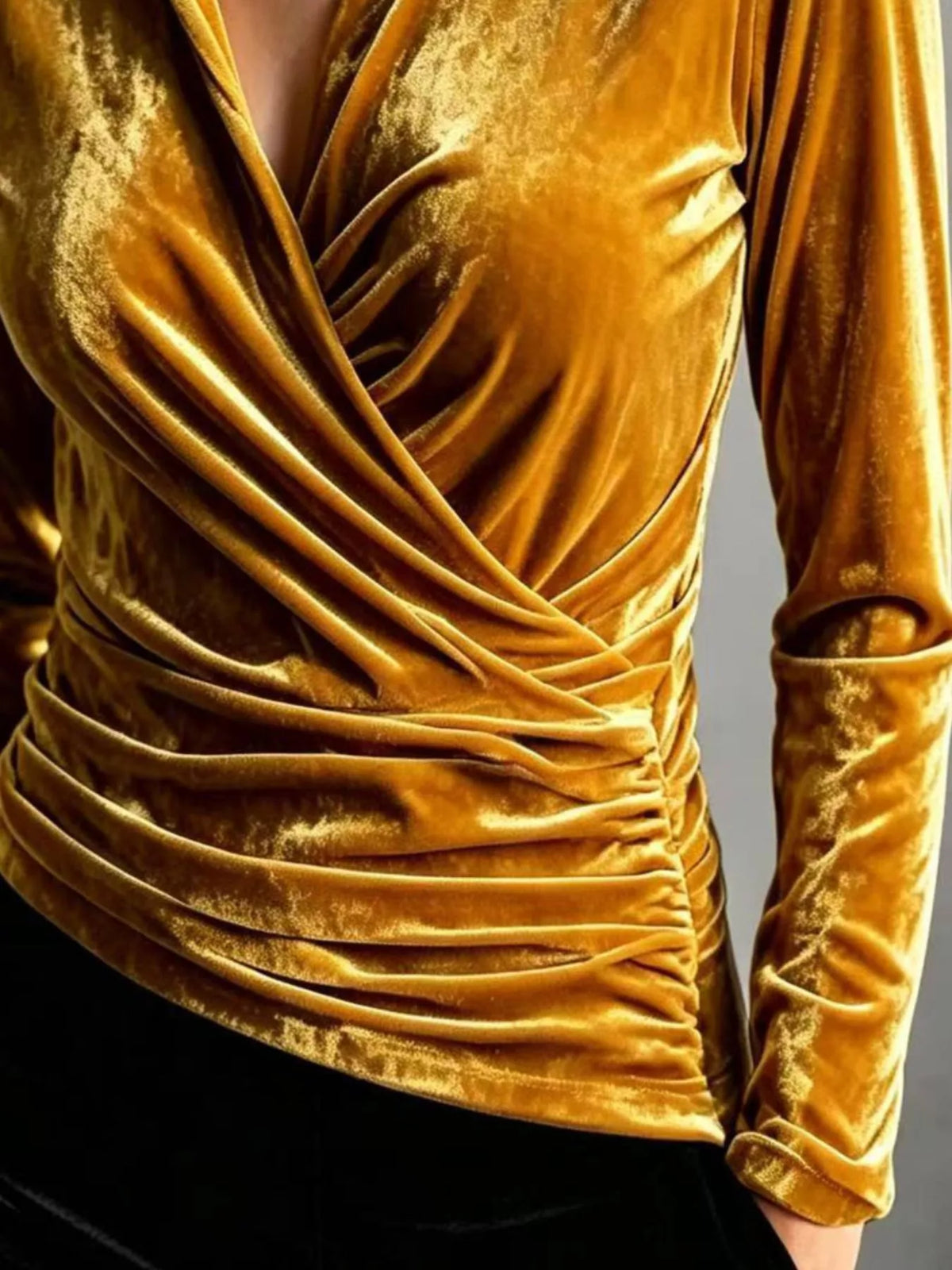 Gold velvet wrap-front ruched blouse, ruched waist and sleeve detail.