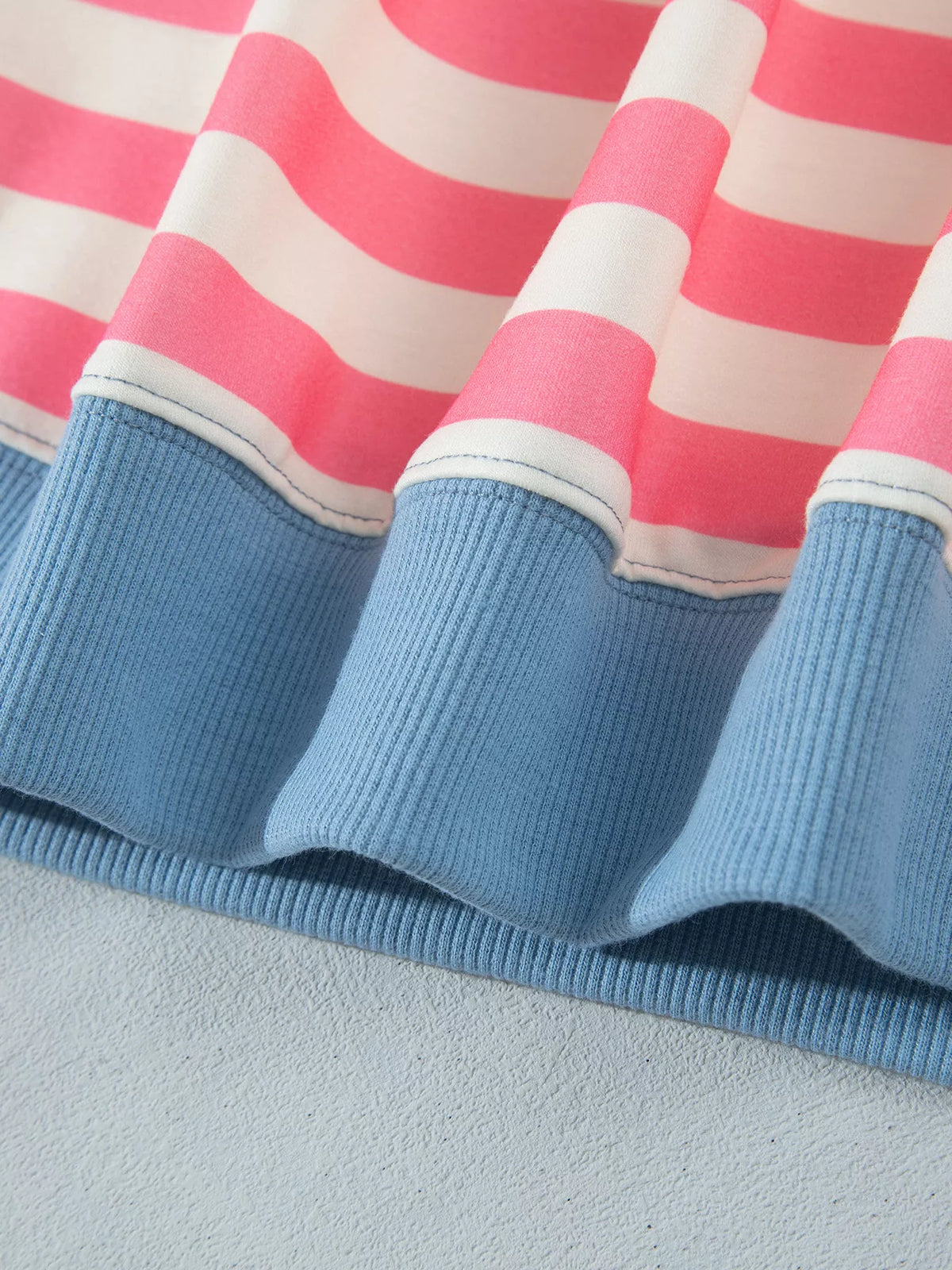 Pink white and blue striped crewneck tunic sweatshirt, ribbed hem detail