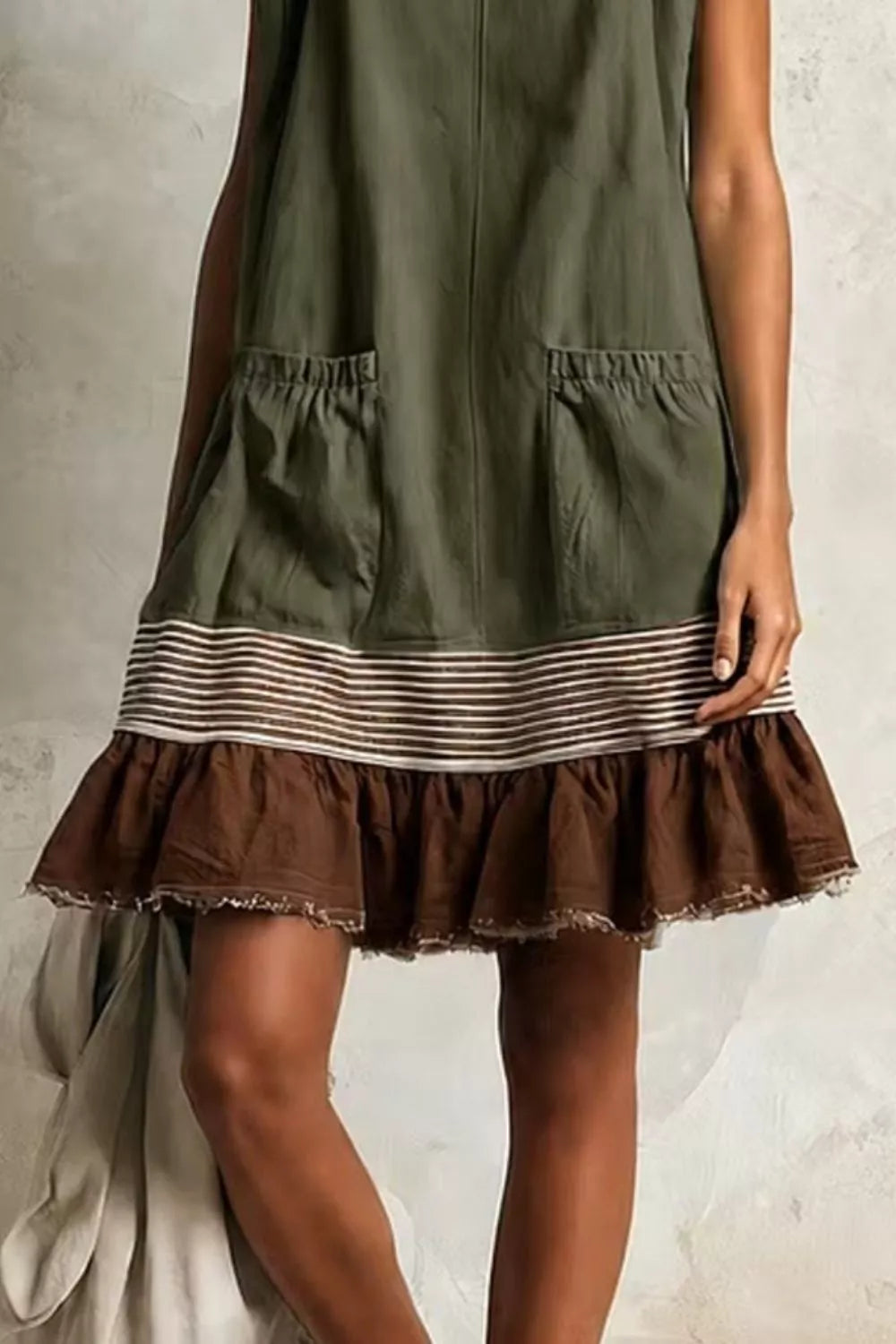 Olive and brown ruffled-hem sleeveless dress, pocket and hem detail