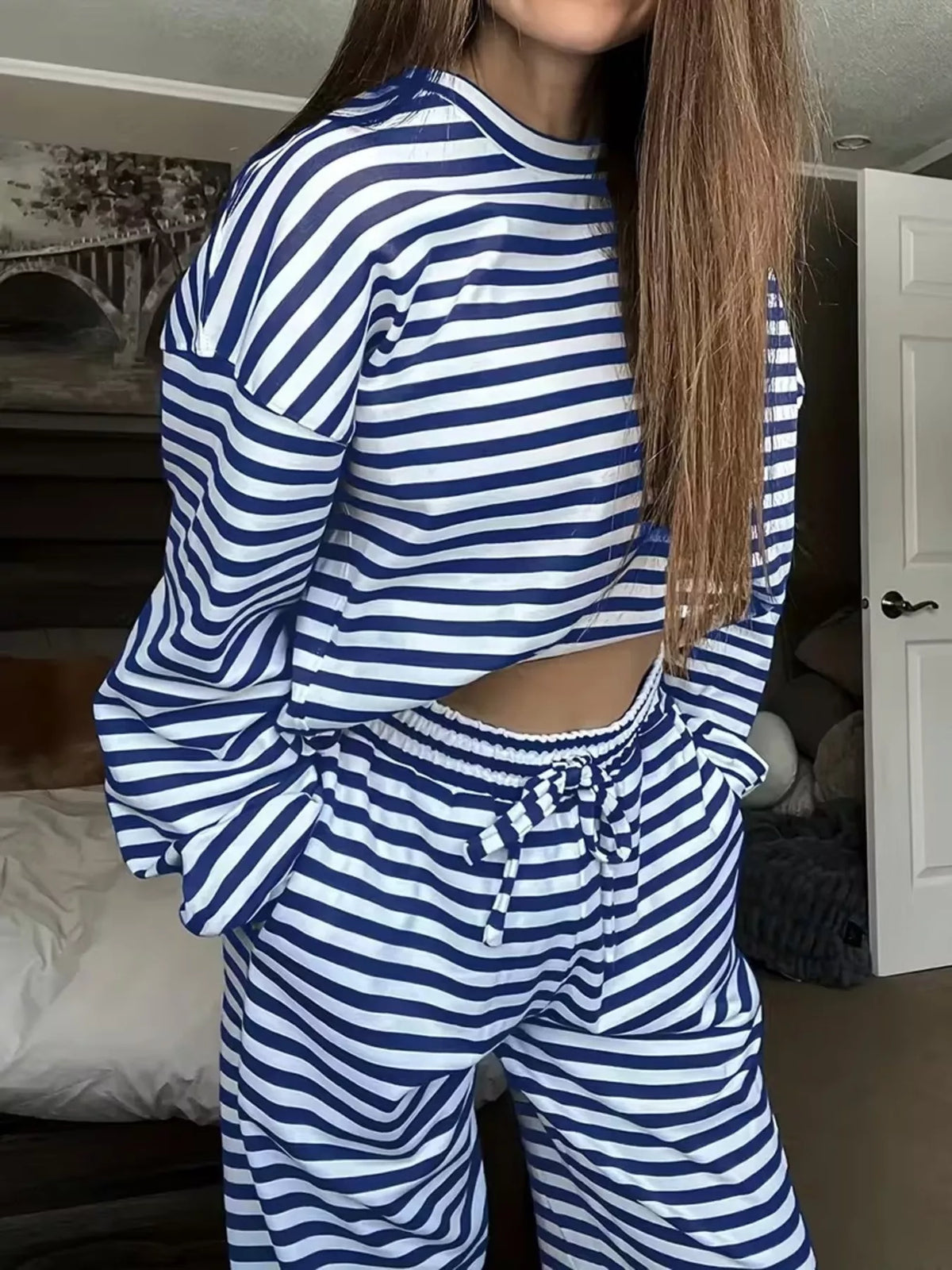 Blue striped long-sleeve top and pants set, top and waistband detail