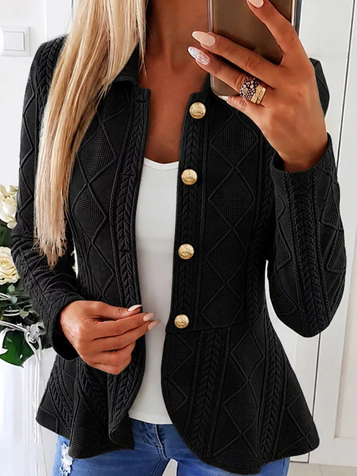 Black cable-knit button-up cardigan — front view