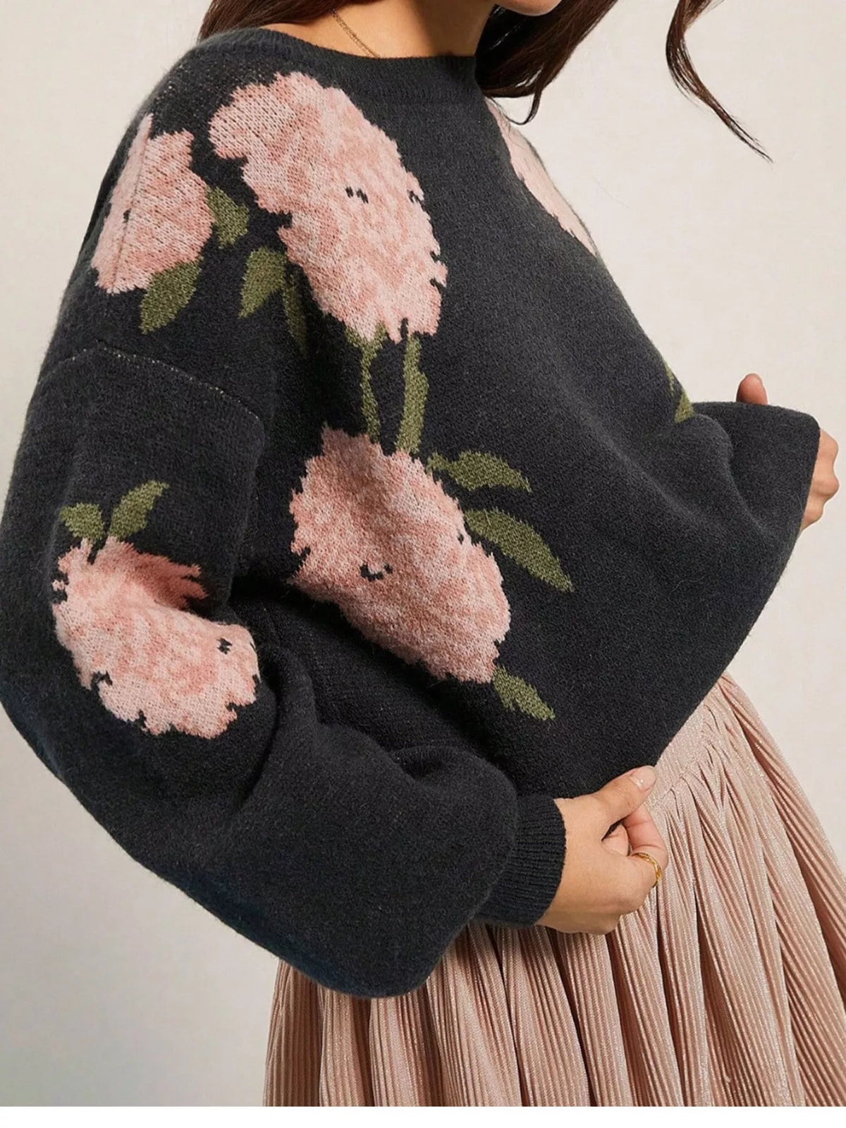 Black floral pattern sweater, floral knit pattern and ribbed cuff