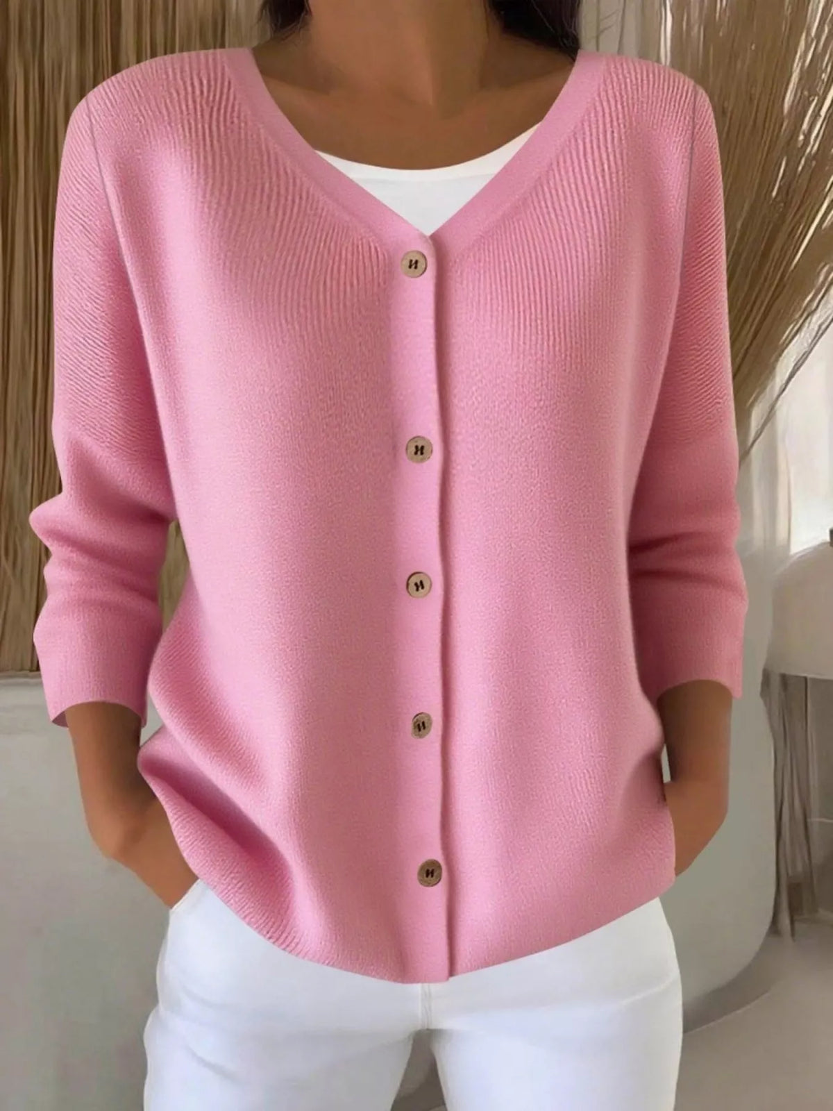Pink ribbed button-front cardigan, front view