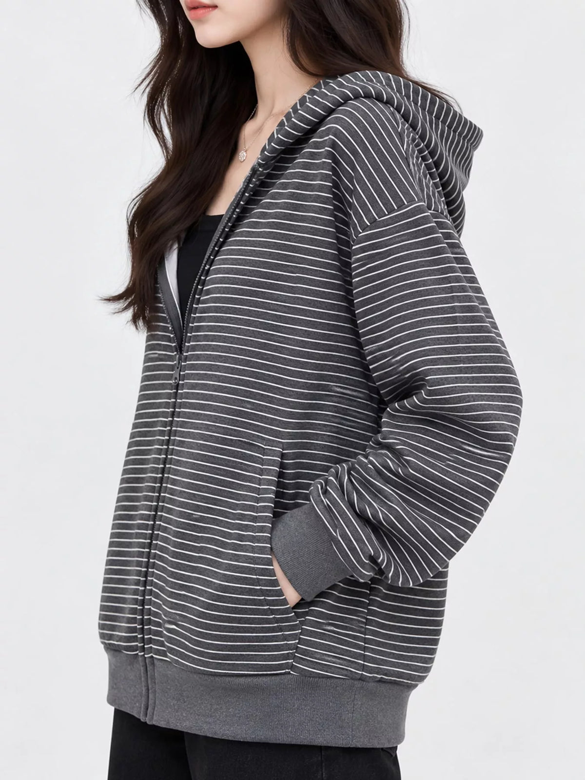 Charcoal and white striped zip-up hoodie, side view