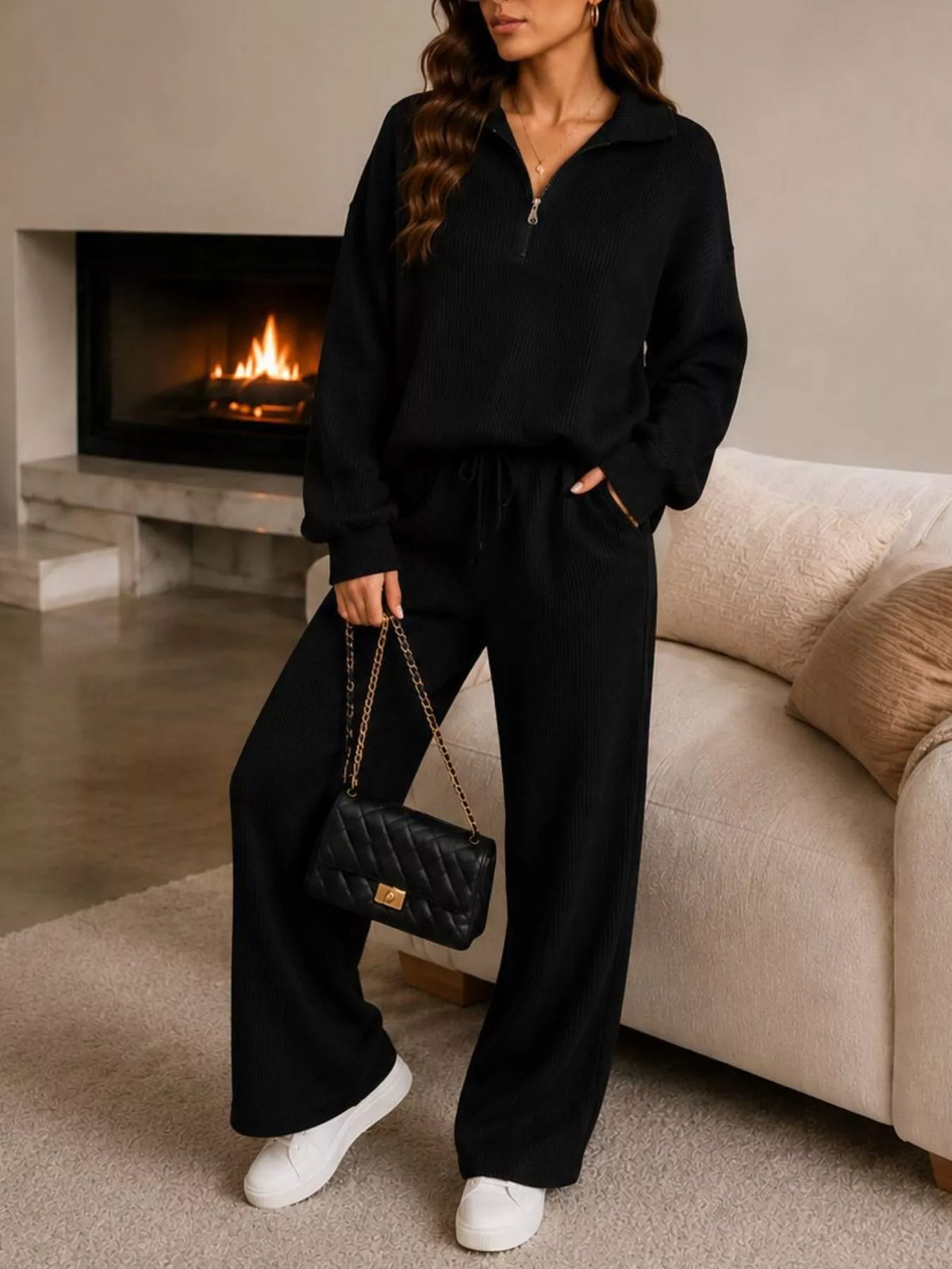 Black quarter-zip knit top and pants set, full front view