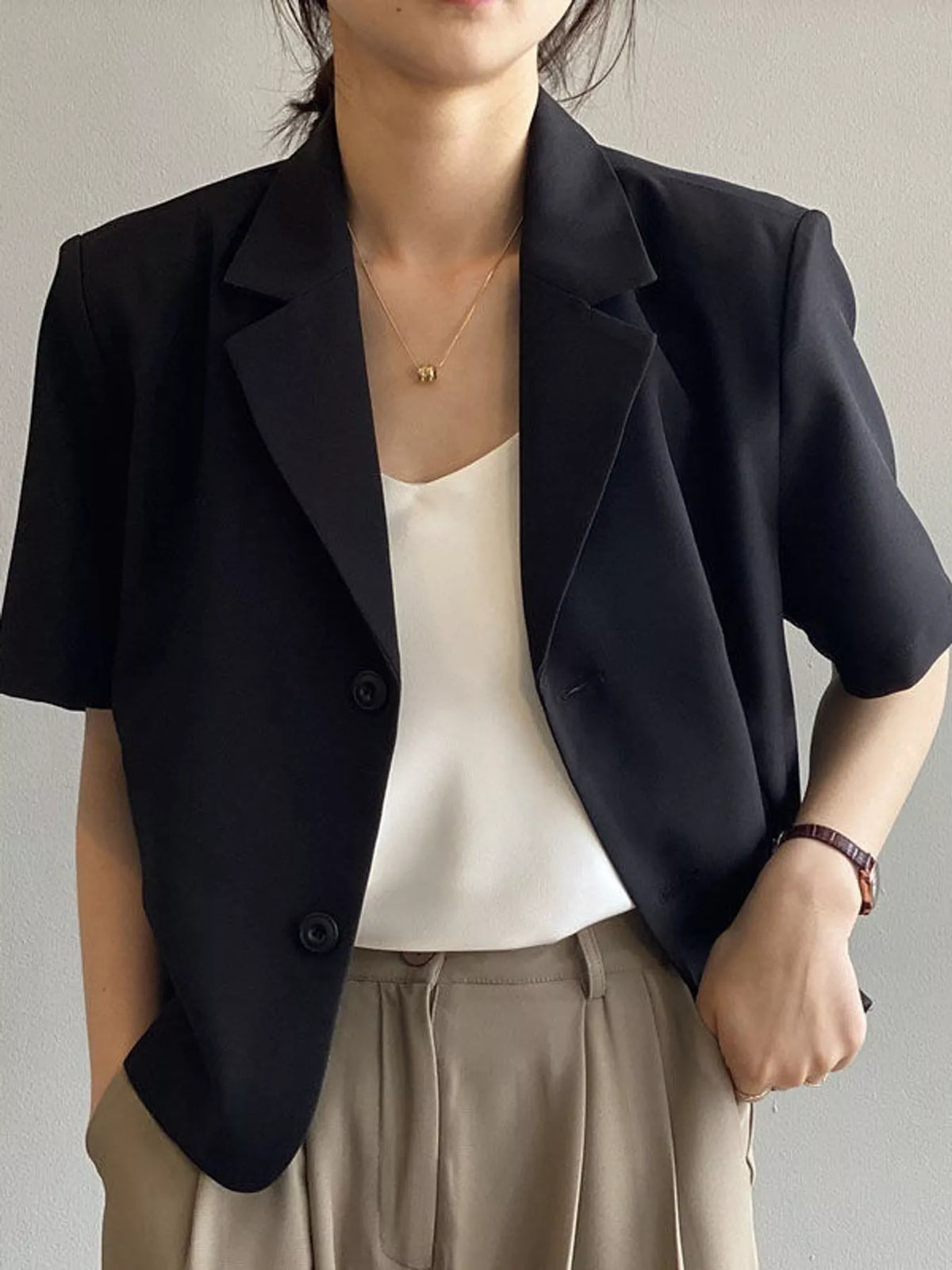 Collared short sleeve blazer, front view on model