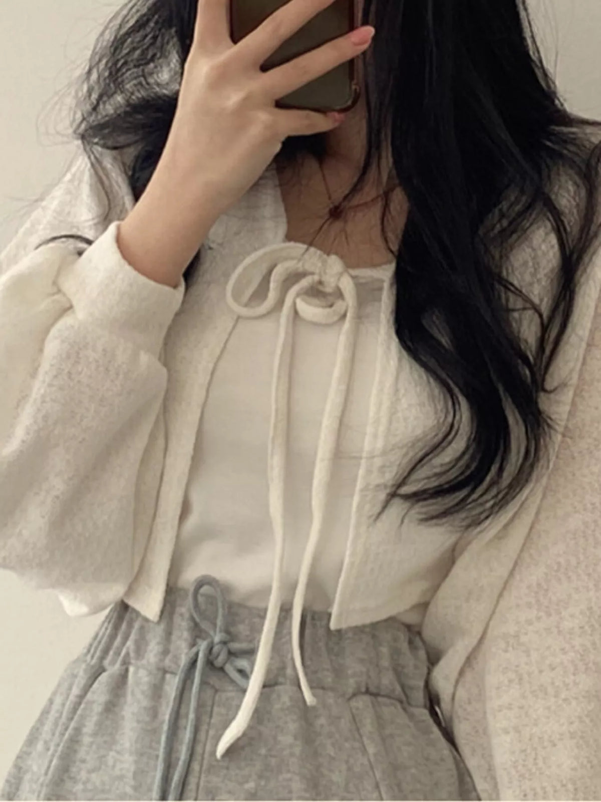 Round neck long sleeve cardigan, front view on model