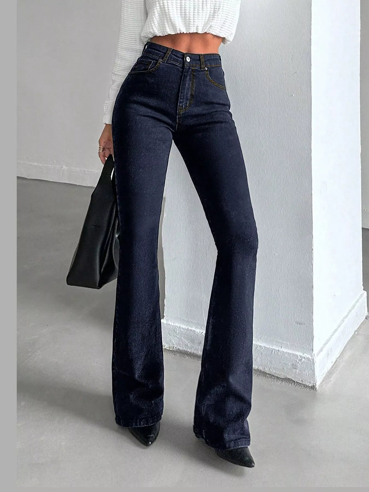 Black high-waisted slim-fit flared jeans