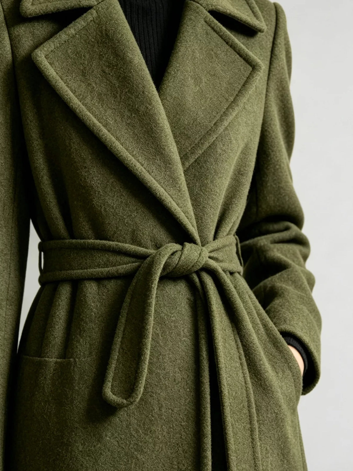 Olive lace-hem tie-waist coat, lapel and waist tie detail