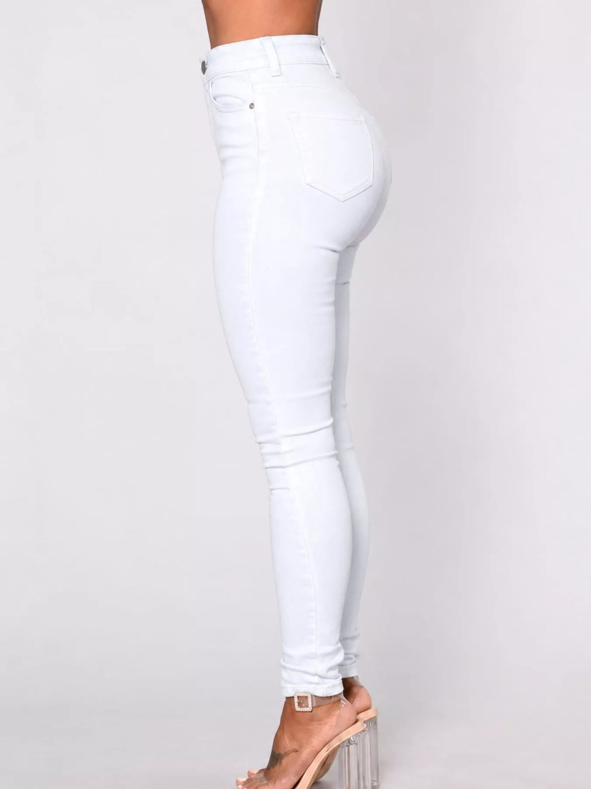 White high-waisted skinny jeans