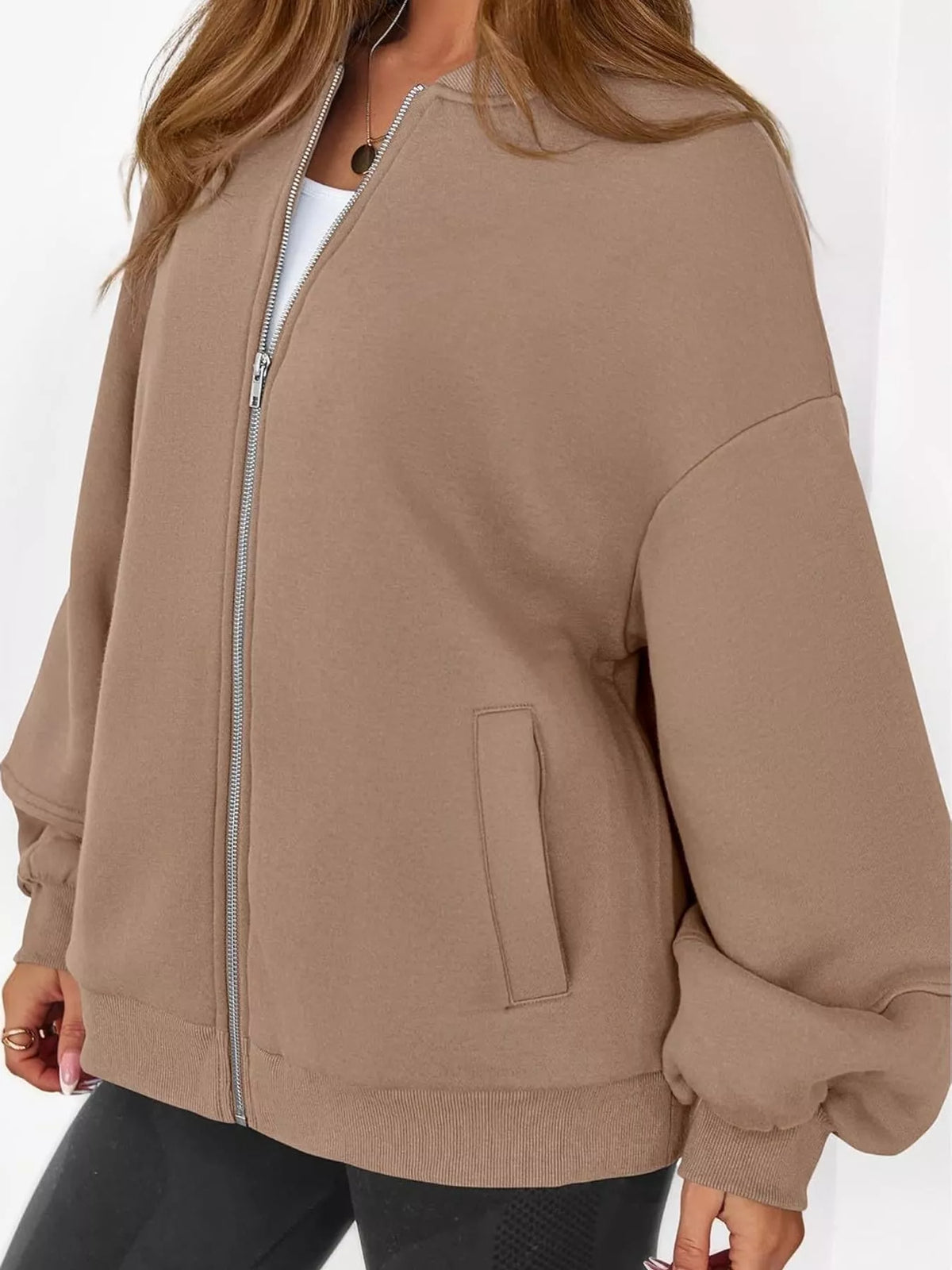 Tan oversized zip-up jacket — front view