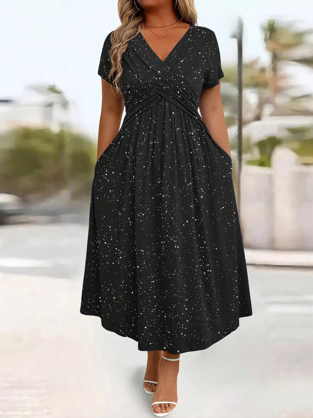 Black speckled short sleeve midi dress with pockets, front view