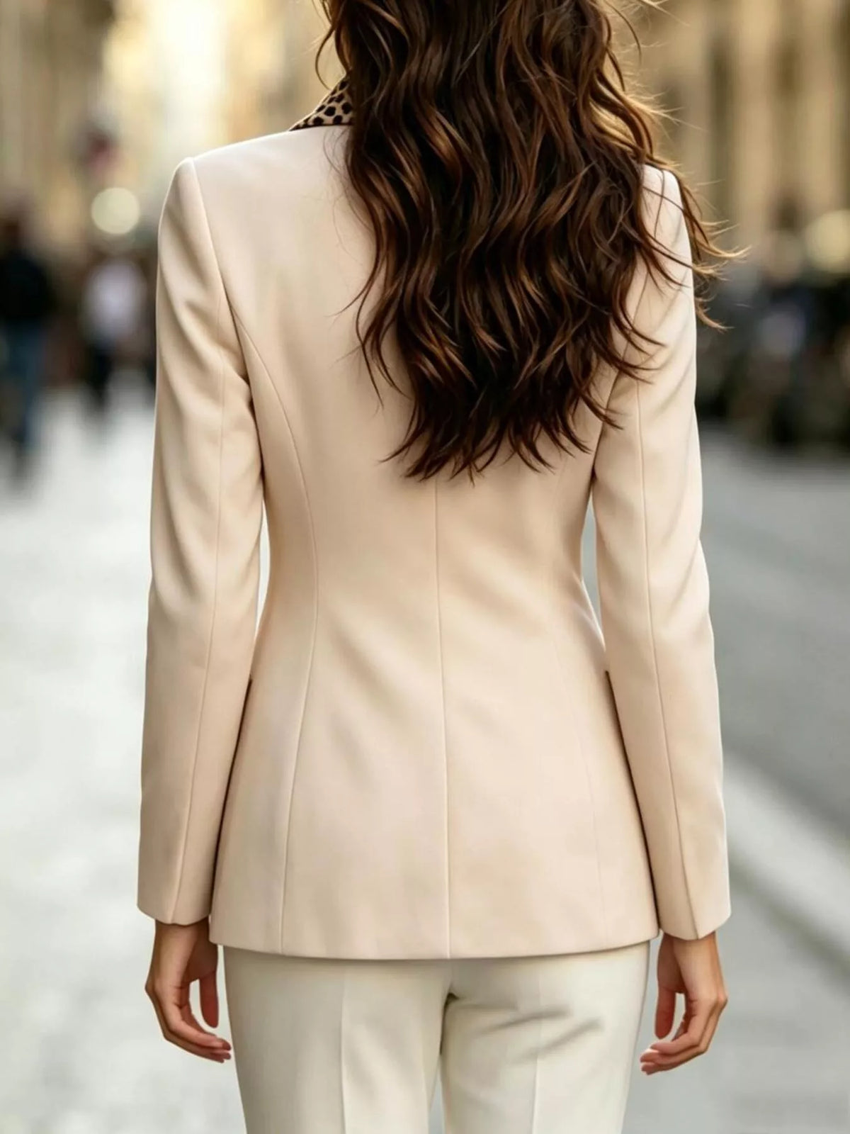 Beige double-breasted blazer with leopard print lapel, back view