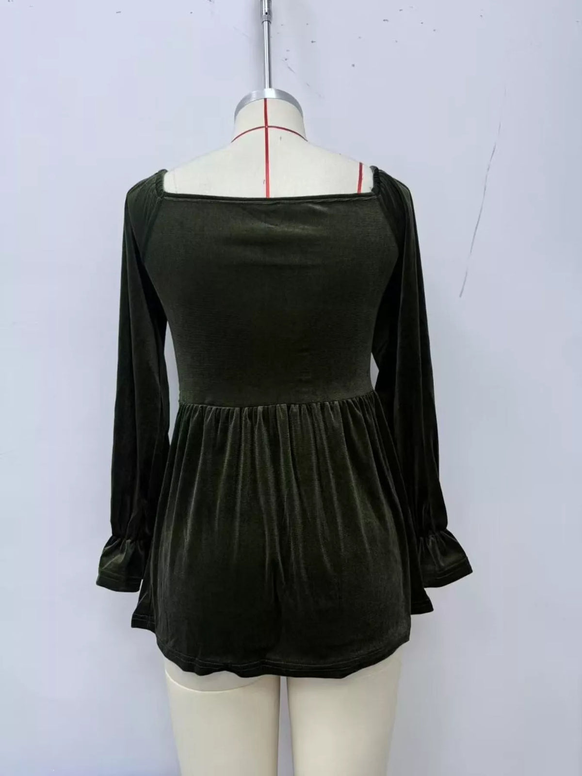 Women's Velvet Smocked Peplum Blouse in Black Forest, back view