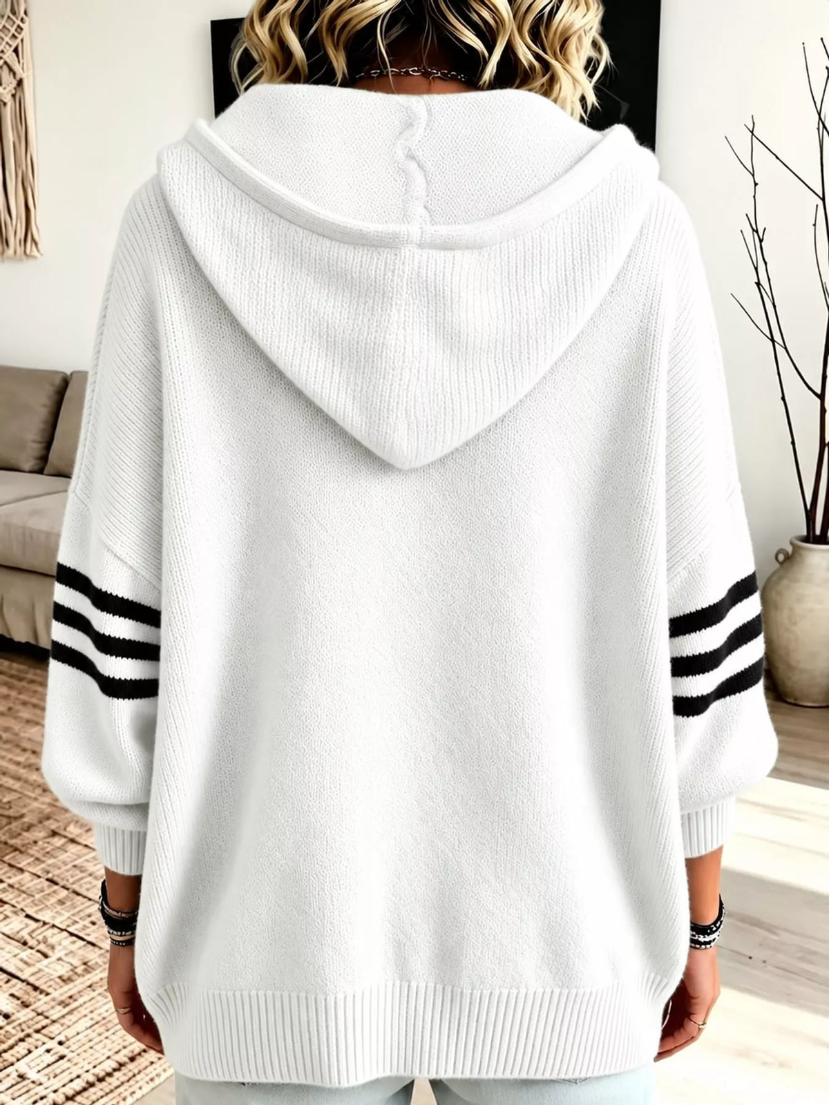 White hooded zip-up knit cardigan, back view